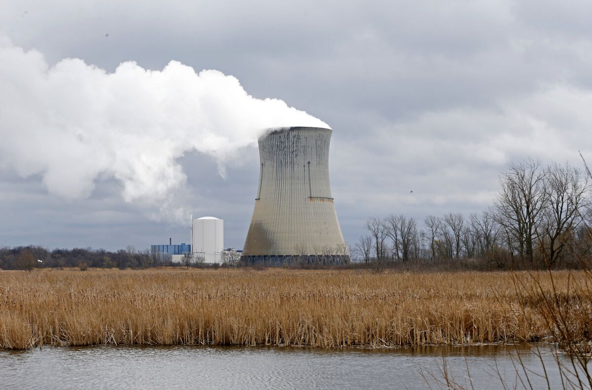 FILE – This April 4, 2017, file photo shows the entrance to FirstEnergy Corp.'s Davis-Besse Nuclear Power Station in Oak Harbor, Ohio. A nuclear plant bailout law should be repealed immediately, Democratic members of the Ohio House announced Wednesday, July 22, 2020, as a bribery scandal involving one of the state’s most powerful lawmakers unfolded over the law’s passage. (AP Photo/Ron Schwane, File)