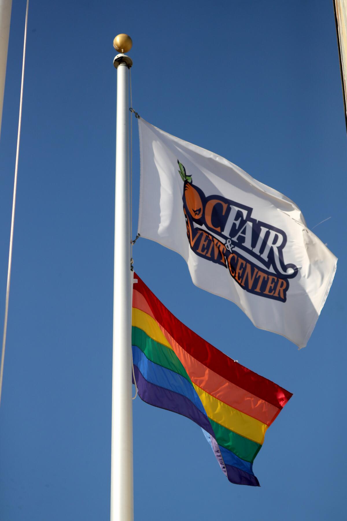 Flags fly over the O.C. Fair & Event Center administration building in Costa Mesa.