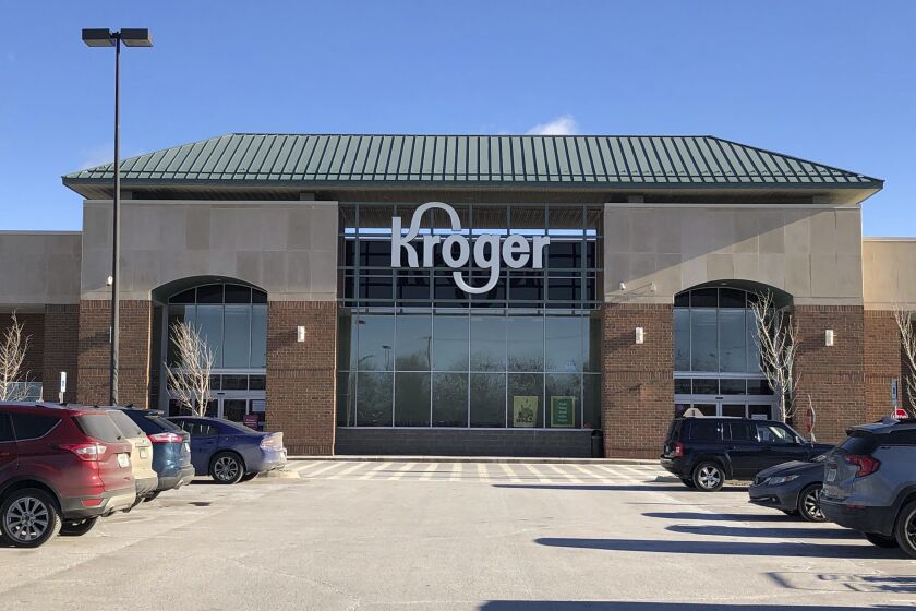 FILE - Exterior of the Kroger grocery store in Novi, Mich., is seen Saturday, Jan. 23, 2021. Two of the nation's largest grocers are planning to merge. Kroger said Friday, Oct. 14, 2022, it has agreed to acquire Albertsons in a $20 billion deal. (Ed Pevos/Ann Arbor News via AP, File)