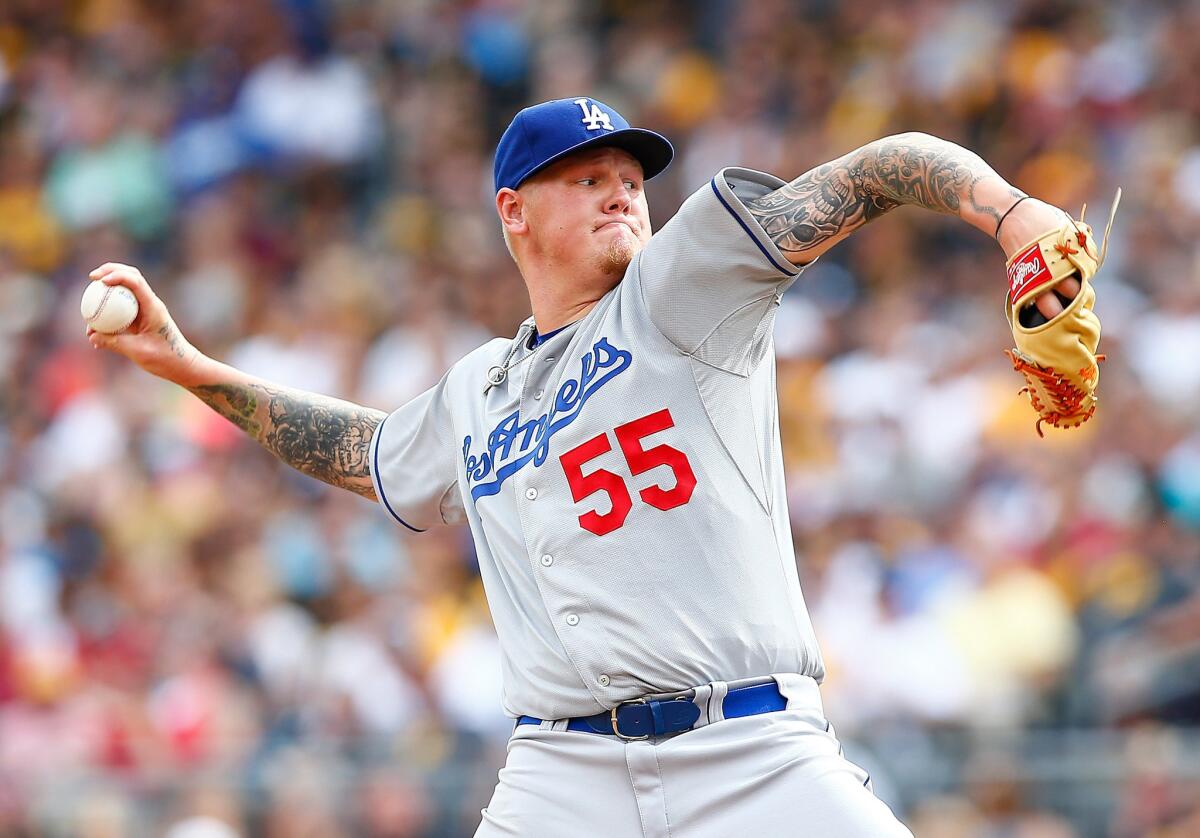 Dodgers starter Mat Latos gave up six runs in four innings of work against the Pirates on Saturday in Pittsburgh.