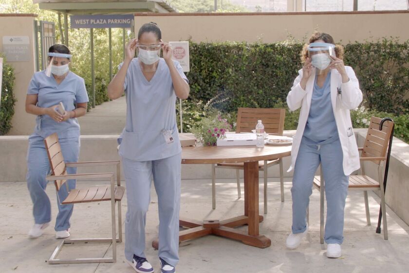 The new season of "black-ish" will deal with COVID-19's effect on essential workers and their families. Pictured, Parminder Nagra, left, Tracee Ellis Ross and Judy Reyes in PPE.