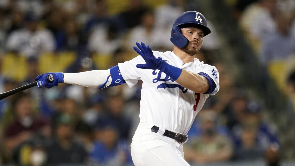 Los Angeles Dodgers' Gavin Lux hits during a baseball game against the Pittsburgh Pirates.