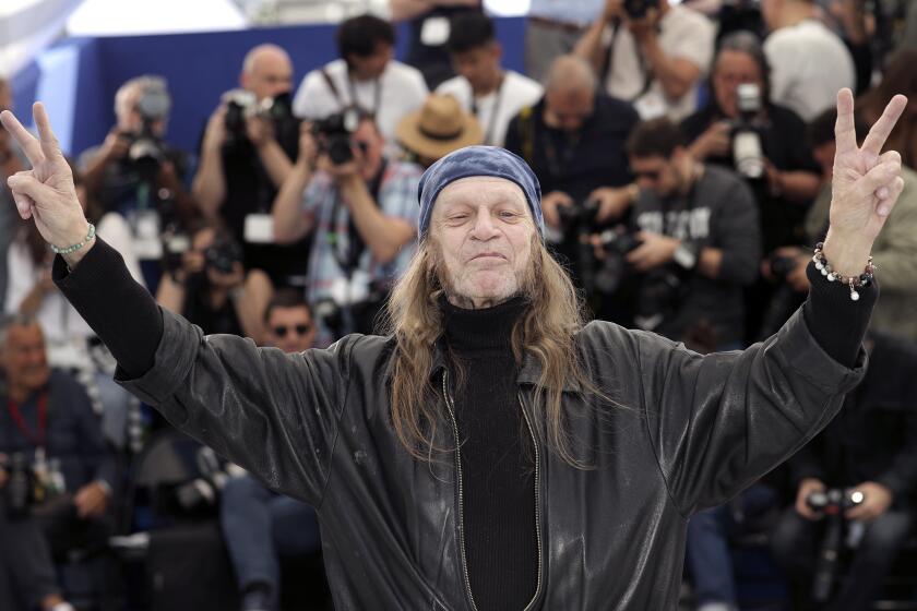 FILE - Actor Leon Vitali poses for photographers at the photo call for the film 'The Shining' at the 72nd international film festival, Cannes, southern France, May 16, 2019. Vitali, the “Barry Lyndon” actor who became one of Stanley Kubrick’s closest associates, has died. He was 74. Vitali died Friday in Los Angeles, his family told The Associated Press Sunday, Aug. 21, 2022. (AP Photo/Petros Giannakouris)