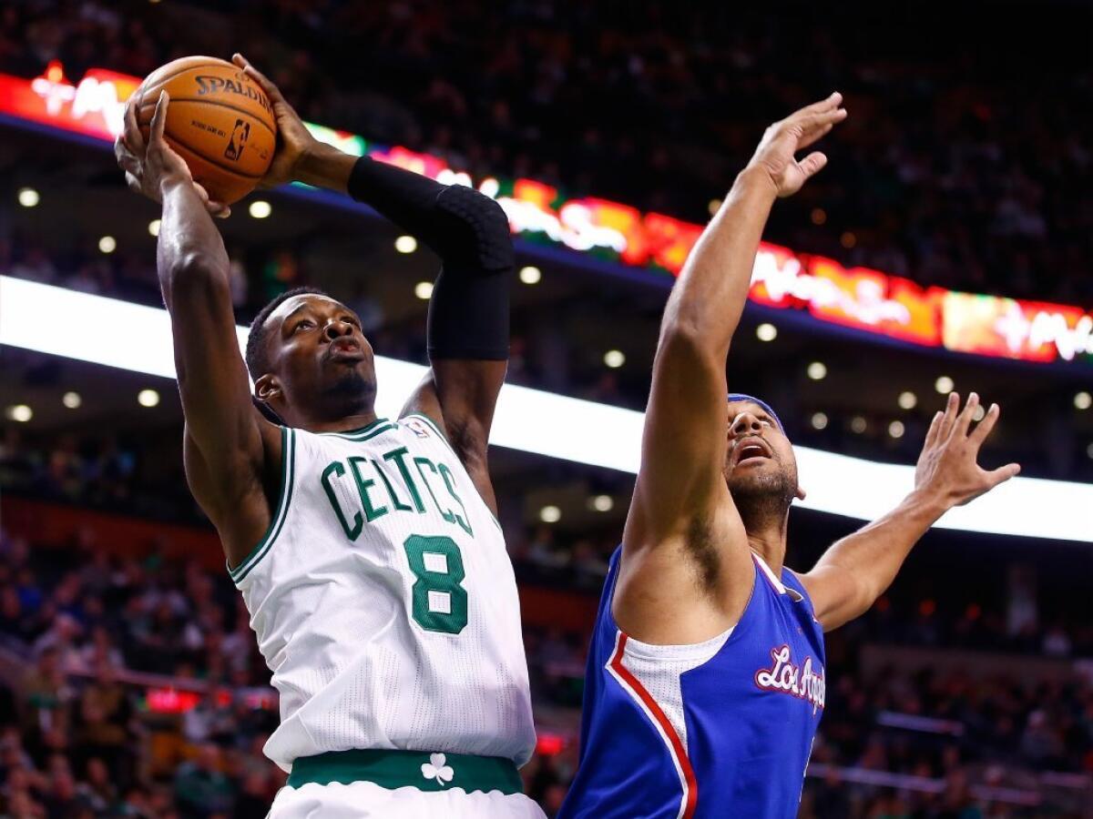 Boston Celtics Jeff Green shoots over the Clippers' Jared Dudley on Thursday.