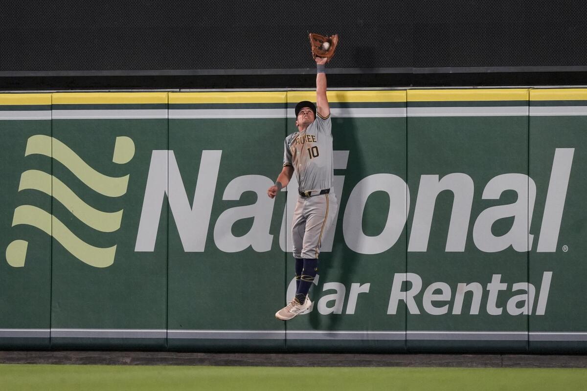 Sal Frelick catches a fly ball hit by Taylor Ward for the final out.