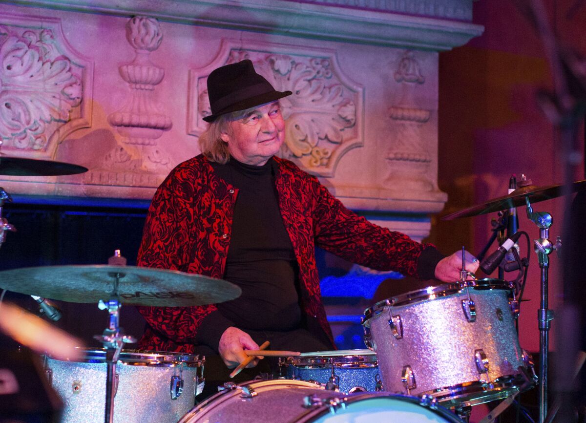 Alan White plays the drums during a concert in New York in 2017.
