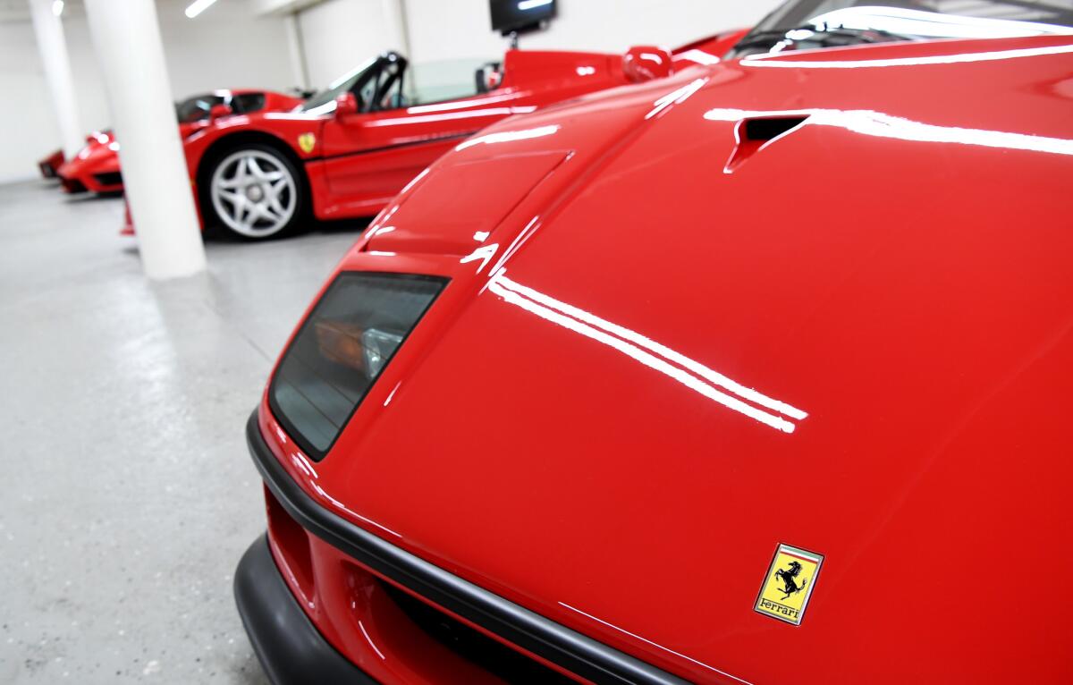 Among Lee's Ferraris are five matching red models. (Wally Skalij / Los Angeles Times)