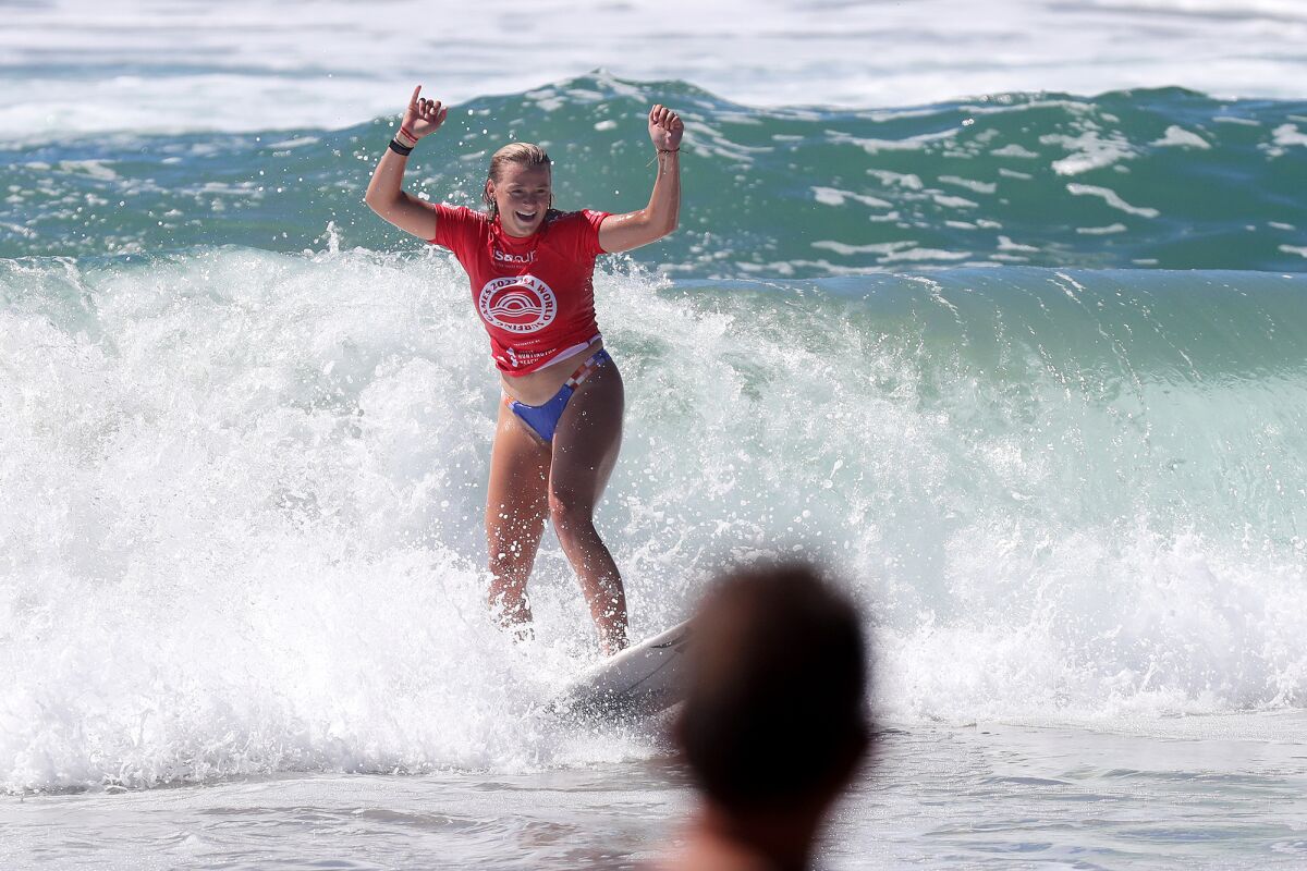 Team USA surfer Kirra Pinkerton, of San Clemente, celebrates winning the ISA World Surfing Games individual women's final.
