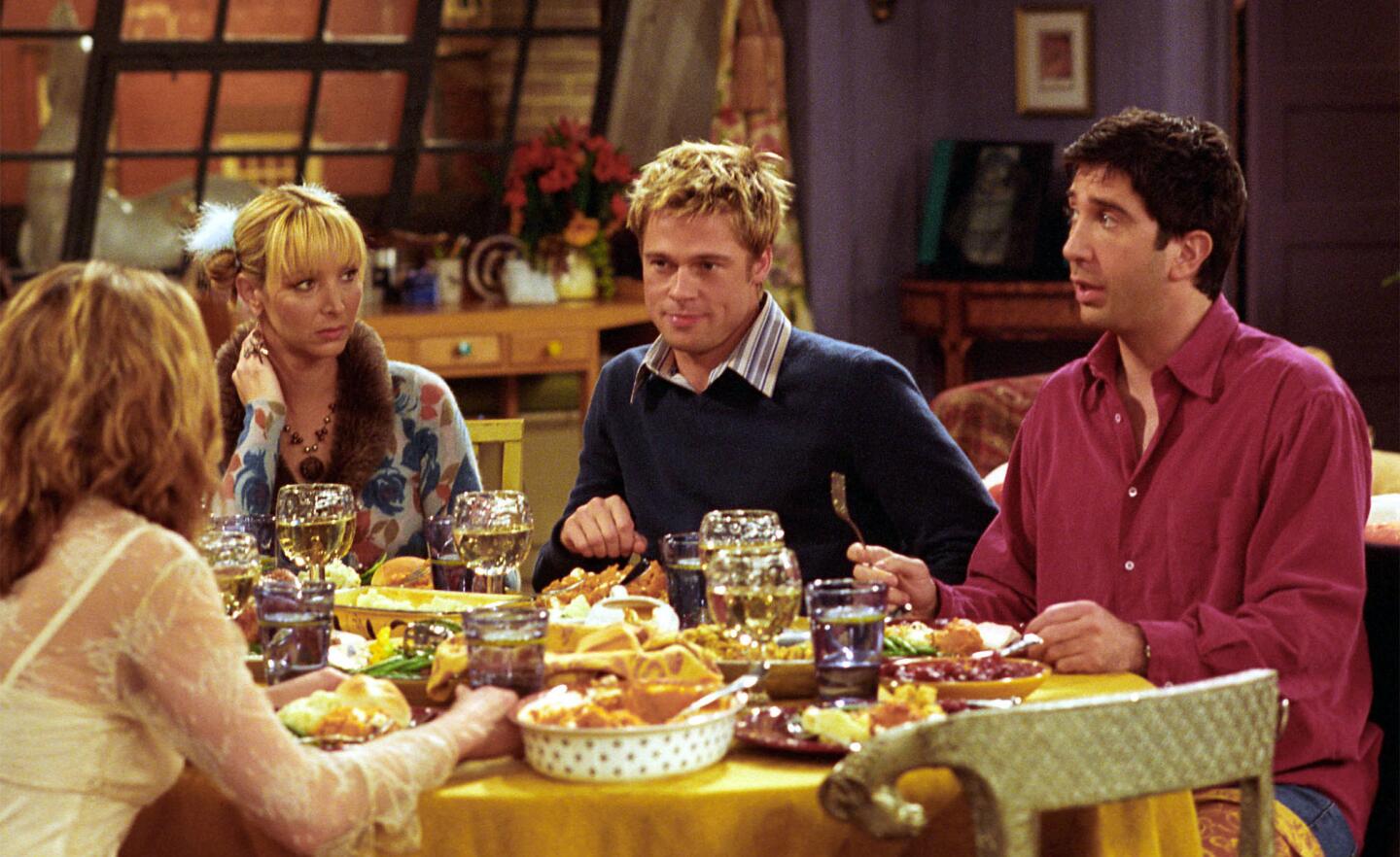 Brad Pitt, center right, joins the cast of NBC's "Friends" as a mystery guest on its Thanksgiving episode in 2001.