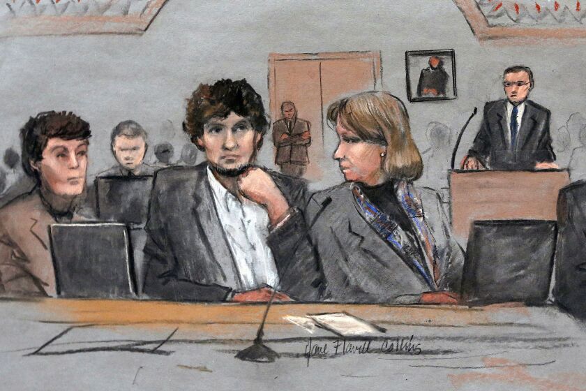 A March 5 sketch shows Dzhokhar Tsarnaev, center, between defense attorneys Miriam Conrad, left, and Judy Clarke during his federal trial in Boston.