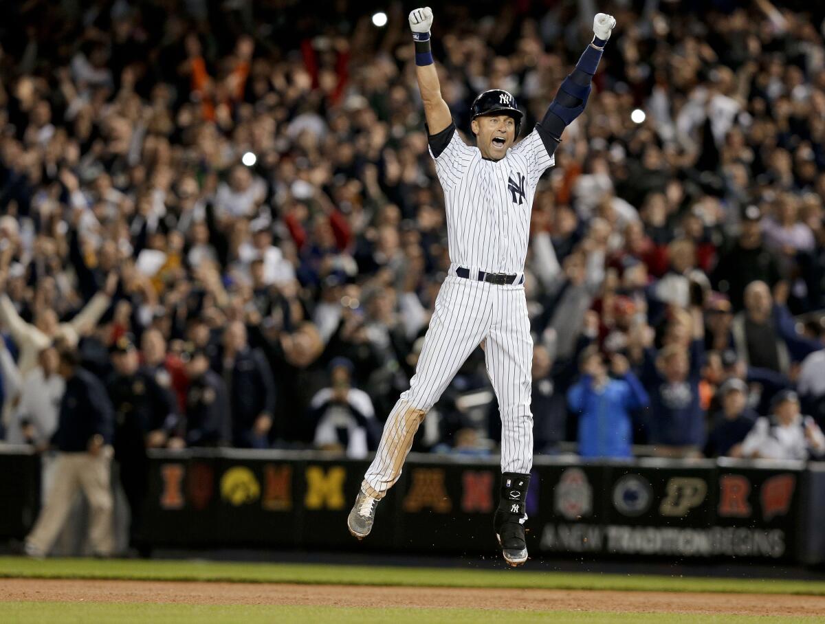 FILE - In this Sept. 25, 2014, file photo, New York Yankees' Derek Jeter jumps after hitting the game-winning single against the Baltimore Orioles in the ninth inning of a baseball game, in New York. Jeter is among 18 newcomers on the 2020 Hall of Fame ballot. On Tuesday, Jan. 21, the Baseball Writers' Association of America will announce the results of its 2020 Hall of Fame balloting. (AP Photo/Julie Jacobson, File)