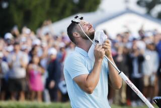 LOS ANGELES, CA - JUNE 18: Wyndham Clark celebrates on the 18th green after winning the US Open.