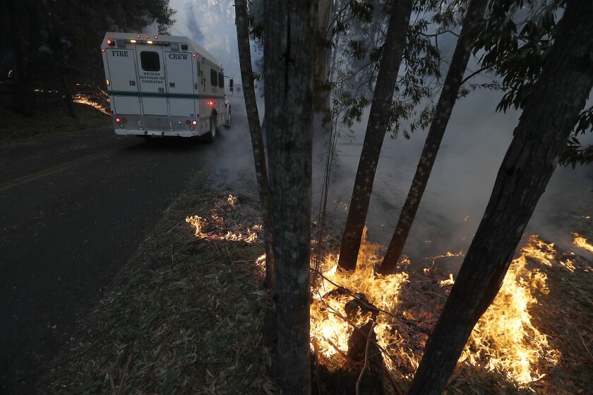 HEALDSBURG, CALIF. - OCT. 26, 2019. Spot fires line Chalk Hill Road near Healdsburg on Sunday morning, Oct. 27, 2019. (Luis Sinco/Los Angeles Times)