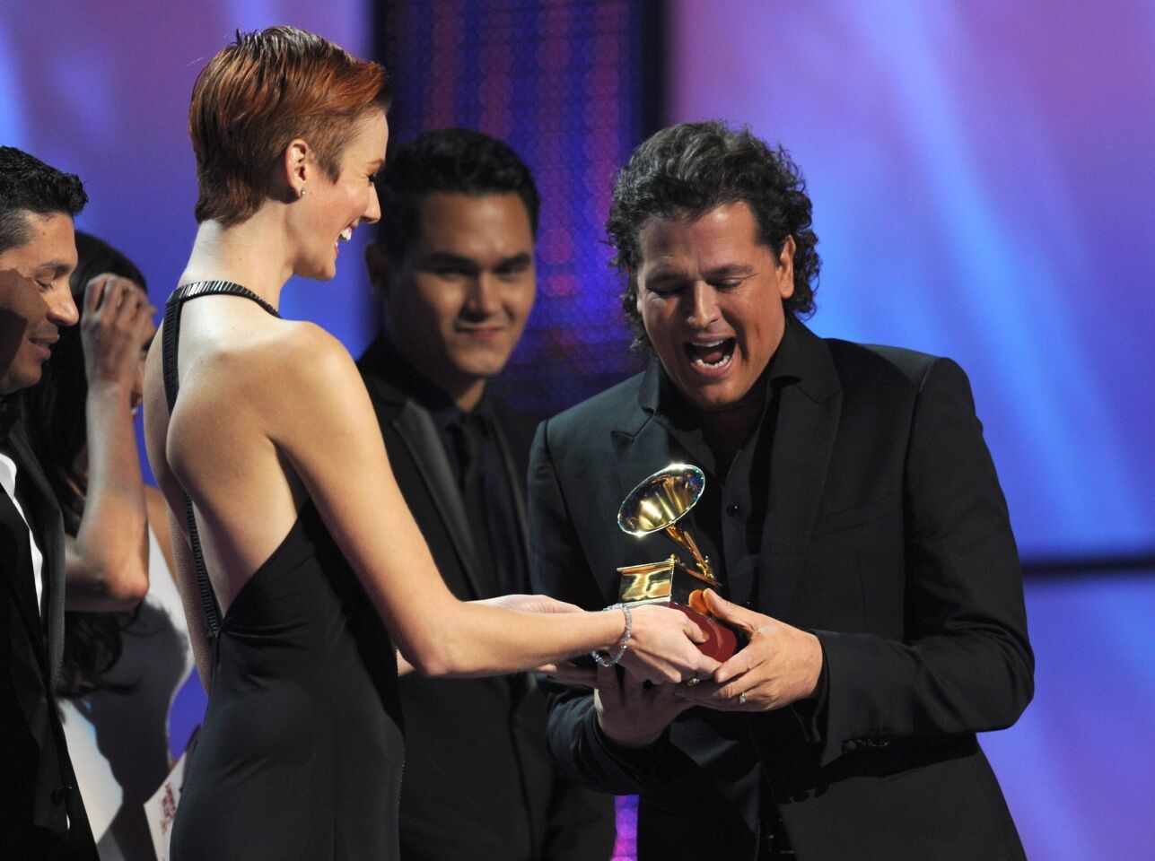 Carlos Vives accepts the Grammy for best tropical fusion album.