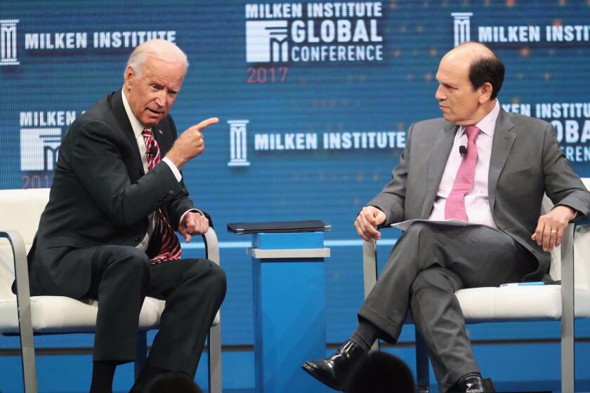BEVERLY HILLS, CA - MAY 03: Former U.S. Vice President Joe Biden (L) and Chairman of the Milken Institute Michael Milken speak during the Milken Institute Global Conference 2017 at The Beverly Hilton Hotel on May 3, 2017 in Beverly Hills, California. (Photo by Frederick M. Brown/Getty Images) ** OUTS - ELSENT, FPG, CM - OUTS * NM, PH, VA if sourced by CT, LA or MoD **