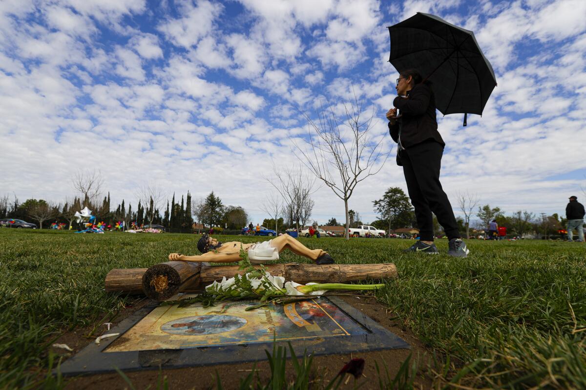 A woman in a cemetery