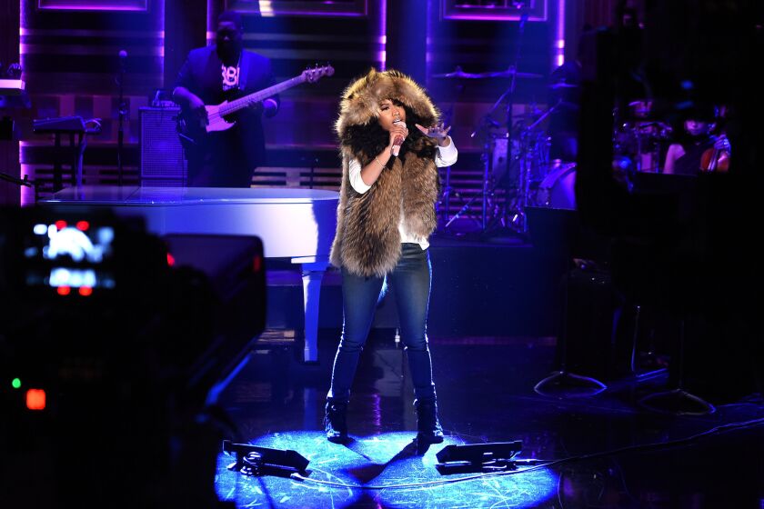 Nicki Minaj, on "The Tonight Show Starring Jimmy Fallon" in 2014, will open Sunday's MTV VMAs.