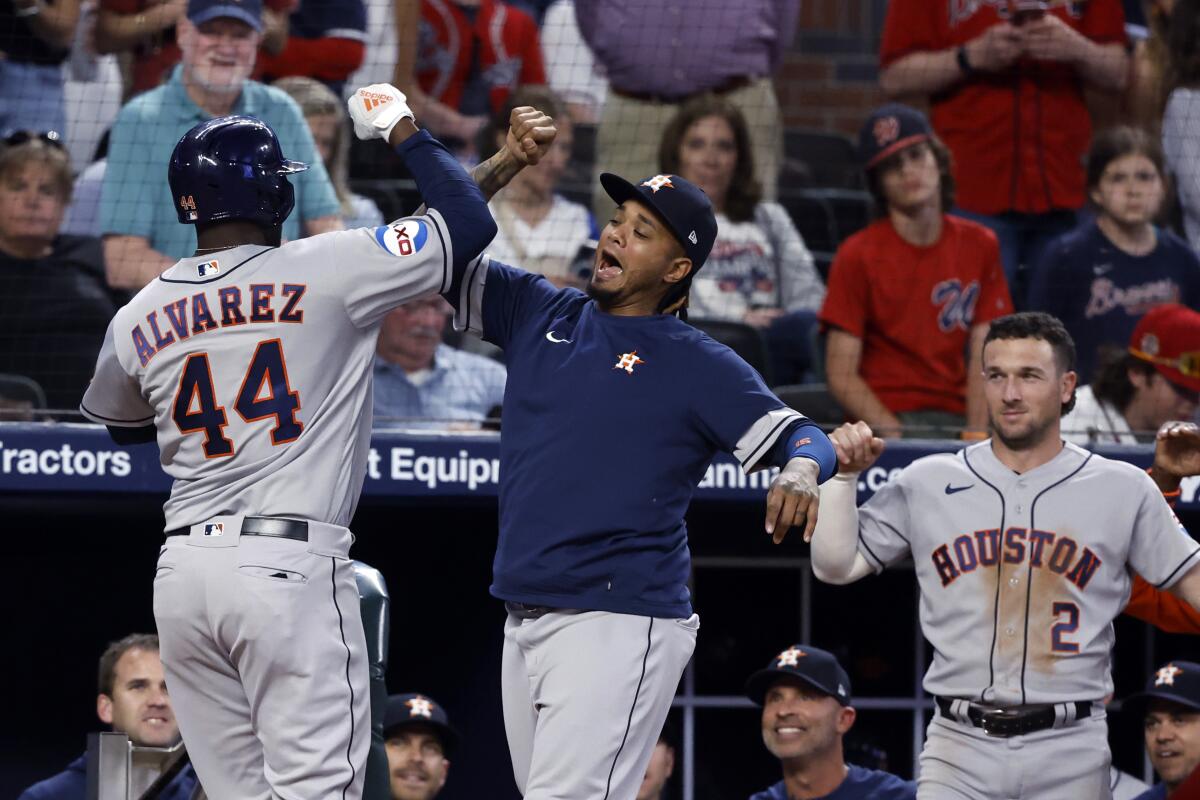 Alvarez lifts Astros over Braves in matchup of last 2 champs - The