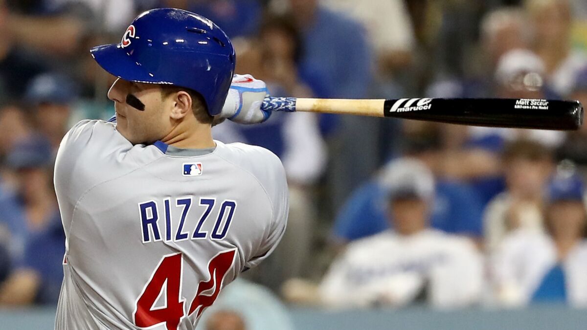Chicago's Anthony Rizzo hits a solo home run in the fifth inning against the Dodgers on Oct. 19.