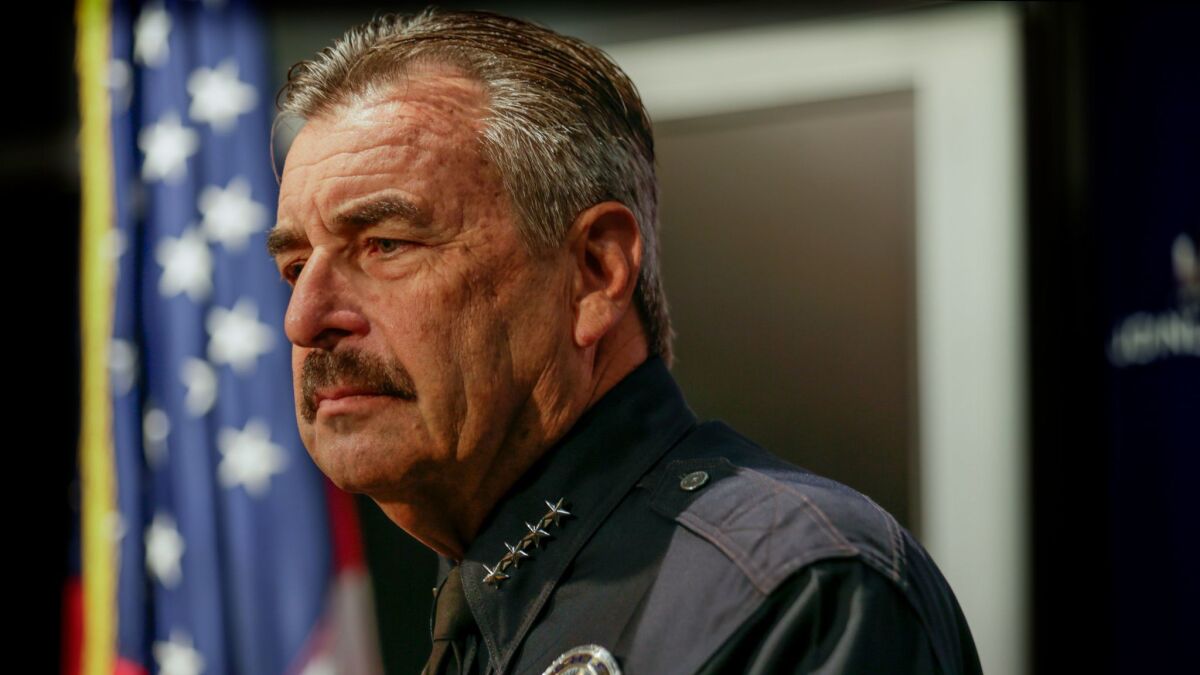 Los Angeles Police Chief Charlie Beck at an Oct. 3 news conference. Beck on Tuesday fired back at a captain who accused LAPD leaders of purposefully misclassifying crime data.