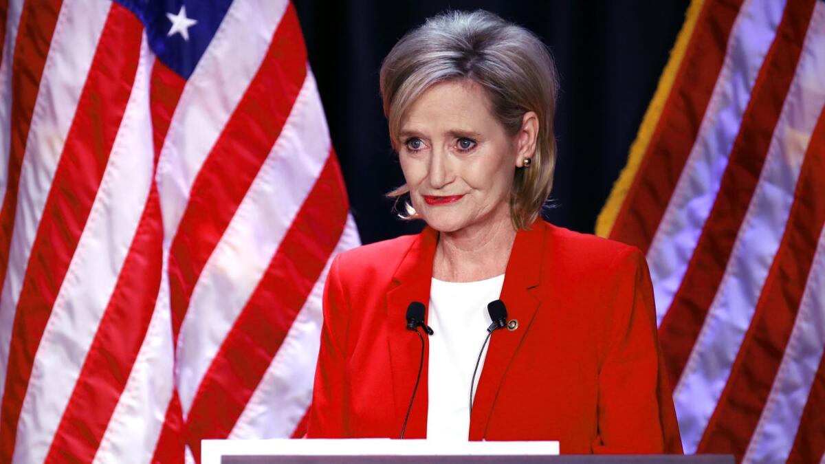 Appointed U.S. Sen. Cindy Hyde-Smith (R-Miss.) answers a question during a televised Senate debate on Tuesday.