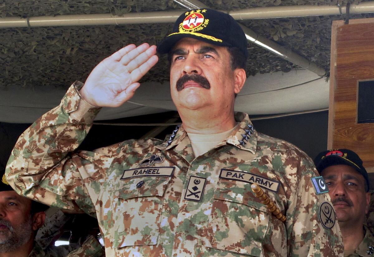 Pakistan's army chief, Gen. Raheel Sharif, salutes during a military exercise in Khairpur Tamiwali, Pakistan, on Nov. 16. He is stepping down on Tuesday.