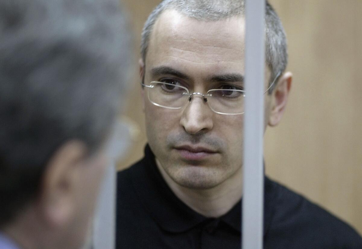 Russian President Vladimir Putin announced Thursday that he planned to pardon political opponent Mikhail Khodorkovsky after 10 years of imprisonment on tax evasion charges widely seen as politically motivated to eliminate a rival for power. The former oil magnate is seen here during his trial in 2004.