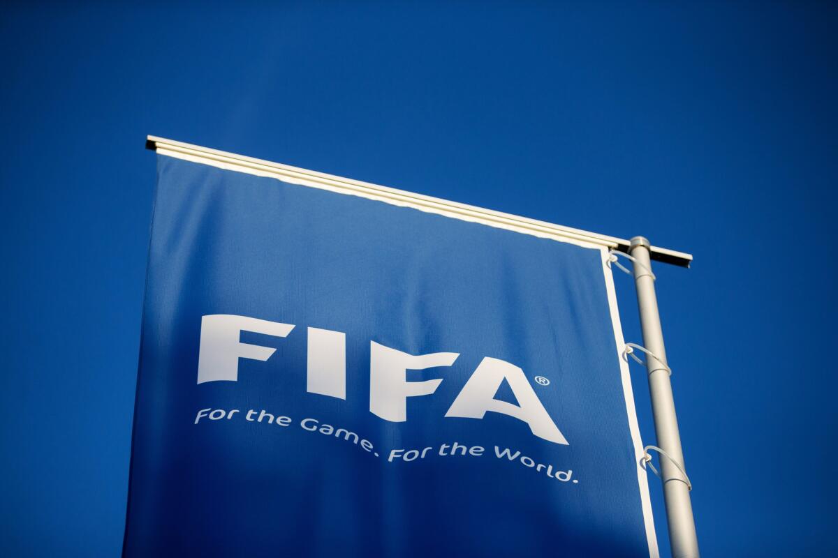 A FIFA logo sits on a flag at the world soccer governing body's headquarters on June 2 in Zurich, Switzerland.