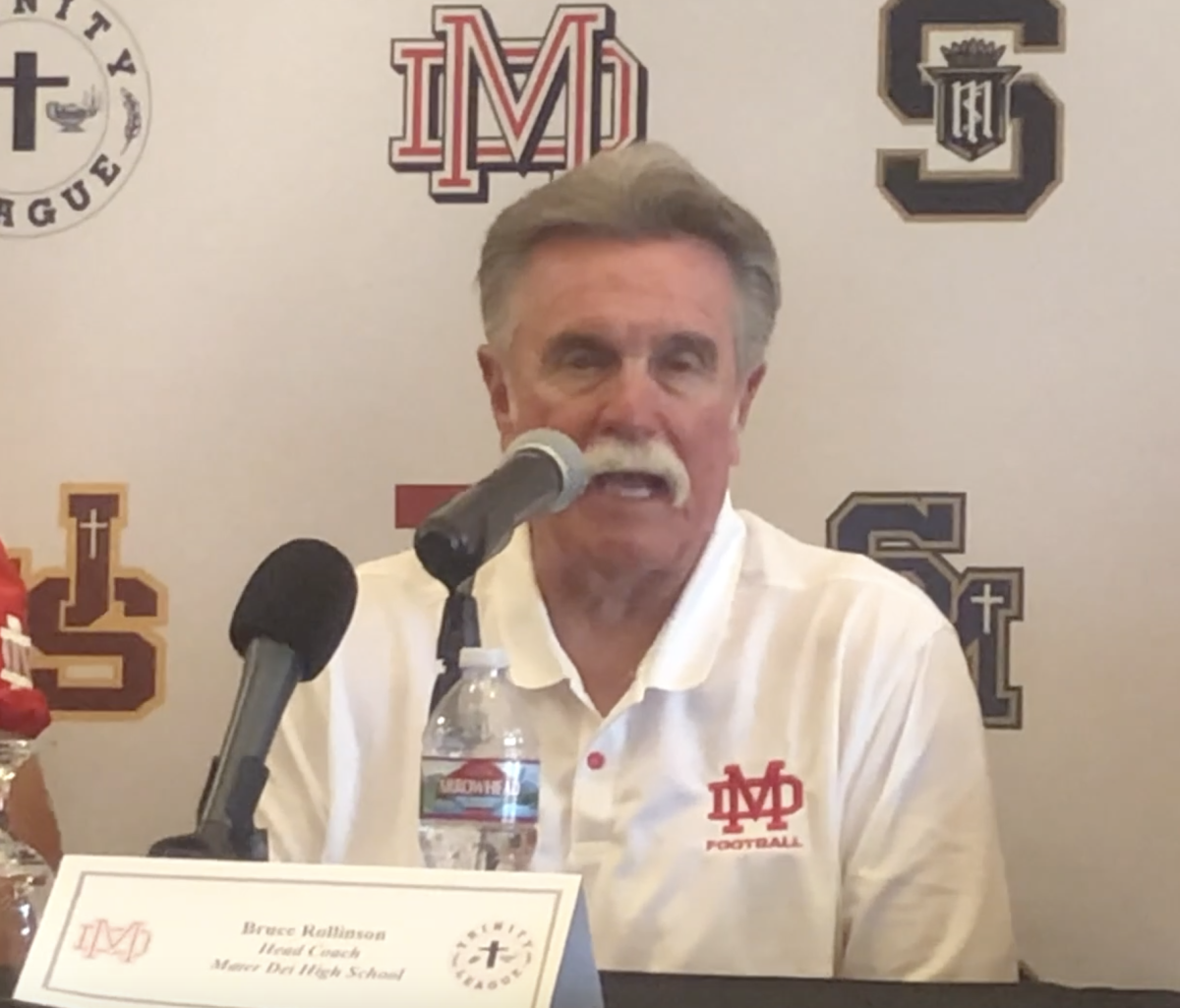 Mater Dei coach Bruce Rollinson talks about watching former players in college football.