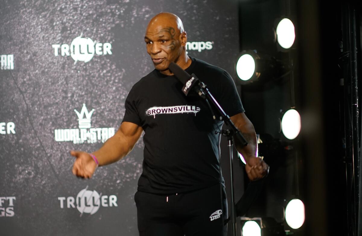 Mike Tyson speaks during a news conference at his weigh-in at the JW Marriott in downtown Los Angeles on Friday.