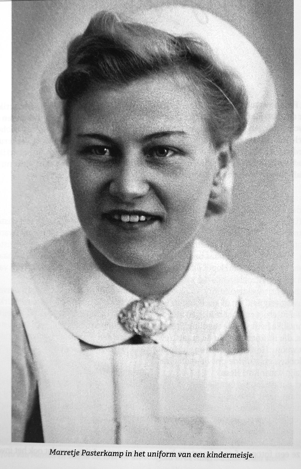 A portrait of a young Marretje Pasterkamp in nurse's cap.