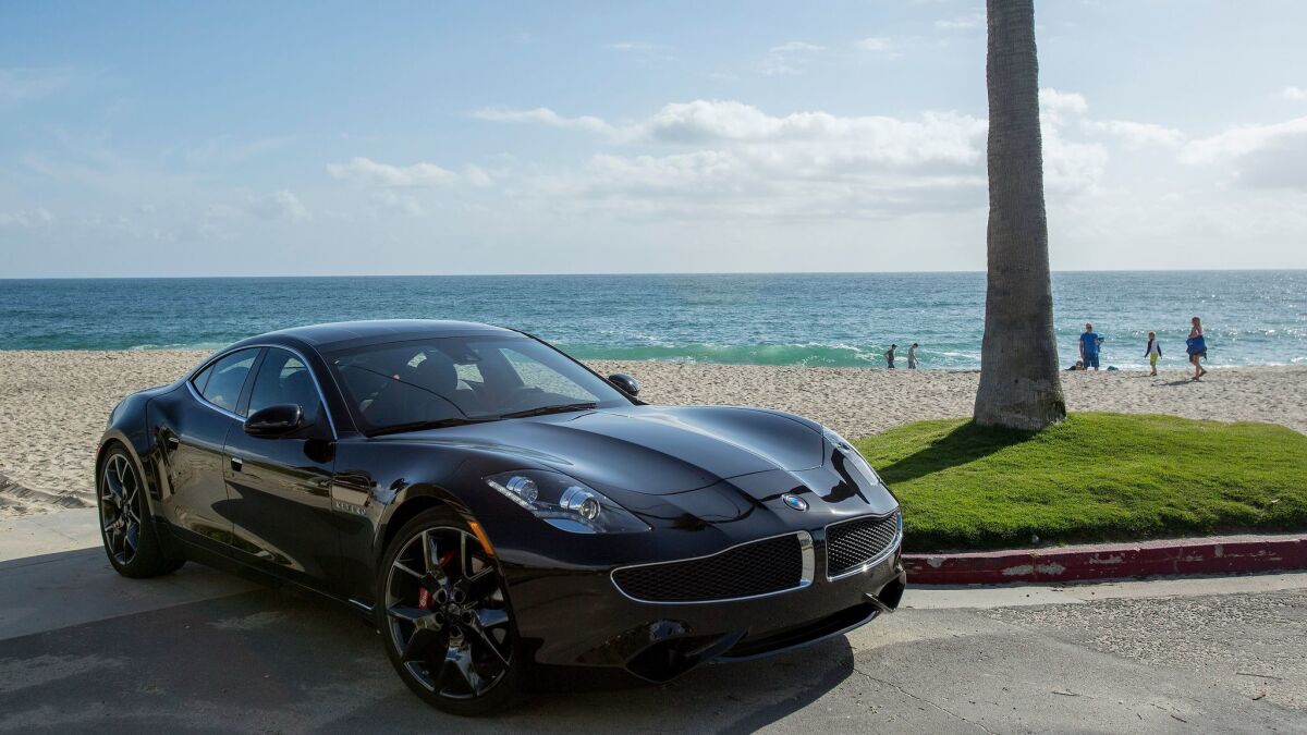 The sleek, low slung Revero features design language from the pen of Henrik Fisker, whose company of that name built the original Karma. (Myung J. Chun / Los Angeles Times)