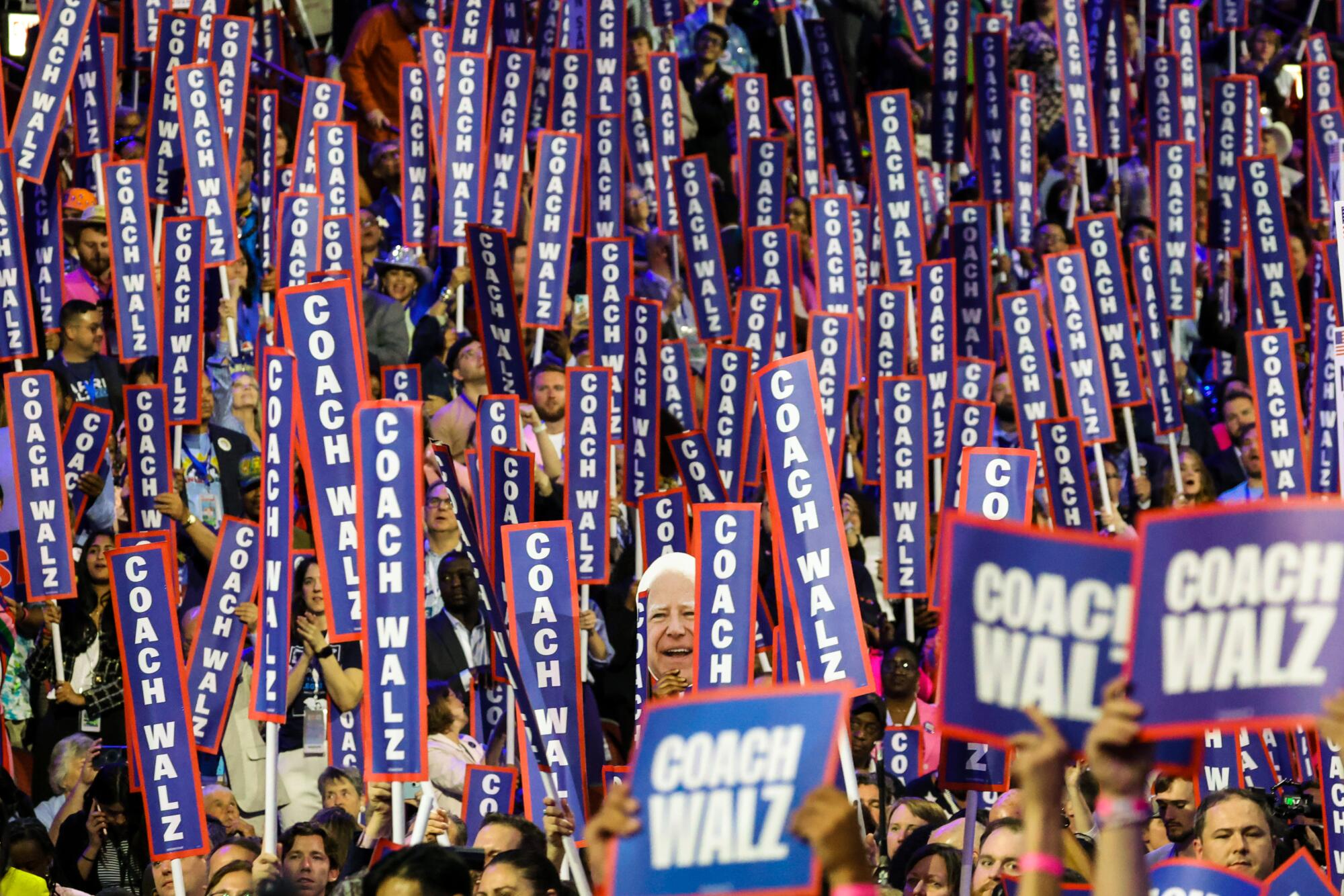     Delegates applaud Minnesota Gov. Tim Walz on Wednesday.