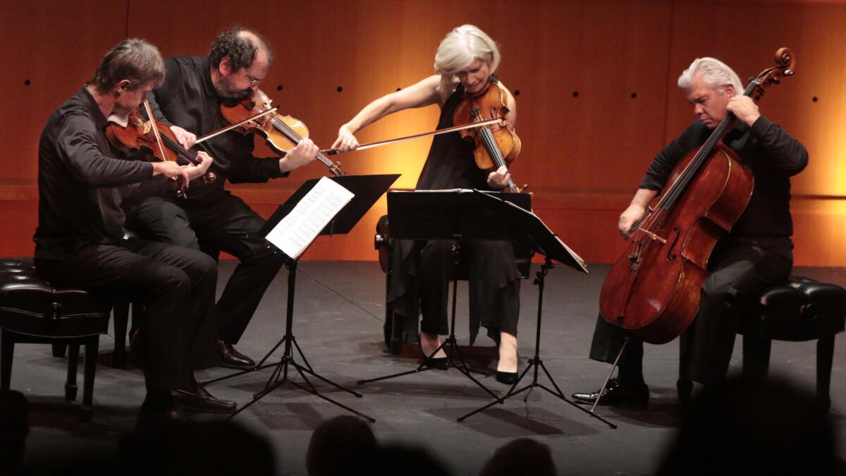 Violinists Lukas Hagen, left, and Rainer Schmidt with Veronika Hagen on viola and Clemens Hagen on cello.