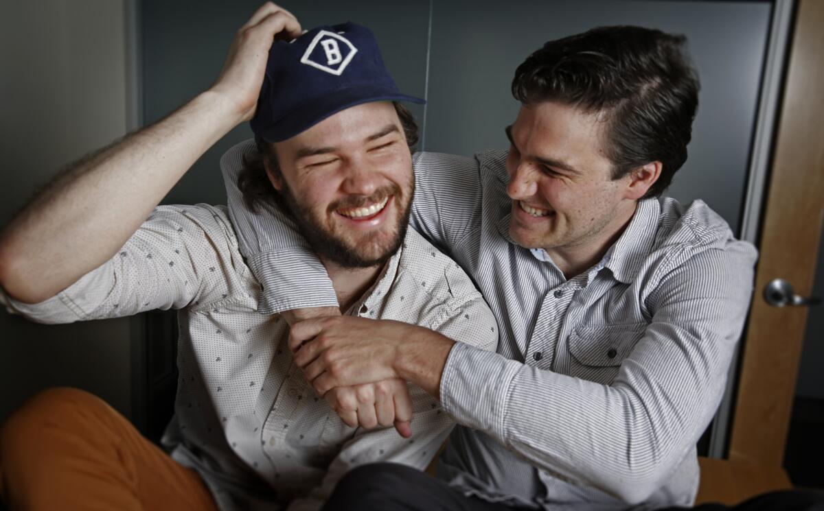 Brothers Chapman, left, and Maclain Way are co-directors of the documentary film, "The Battered Bastards of Baseball."