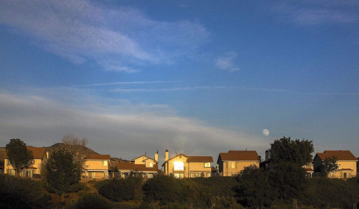 The afternoon sun casts a warm glow on ridgeline homes in Porter Ranch. Thousands of Porter Ranch residents have been relocated to temporary housing as fumes from a natural gas leak pour into the community.