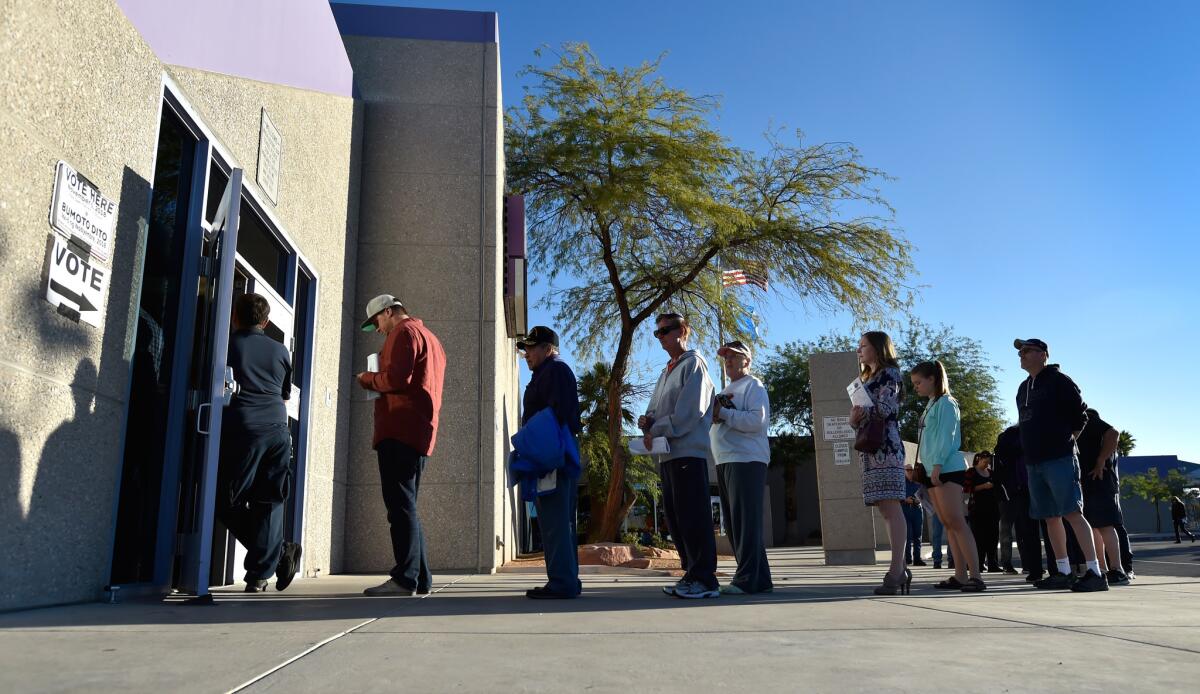 Voters line up at a polling station in Las Vegas.