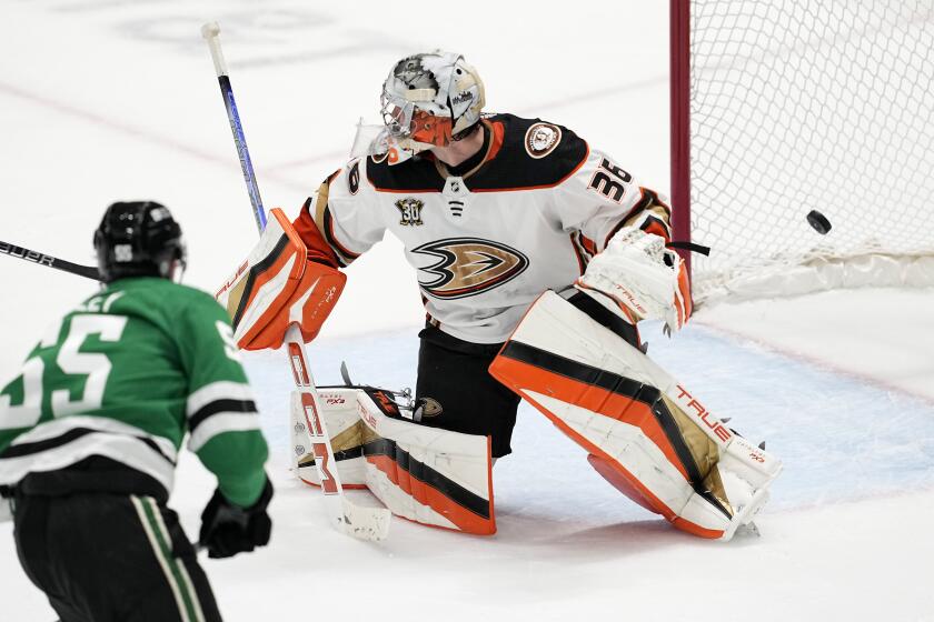 Dallas Stars defenseman Thomas Harley (55) scores against Anaheim Ducks goaltender John Gibson.