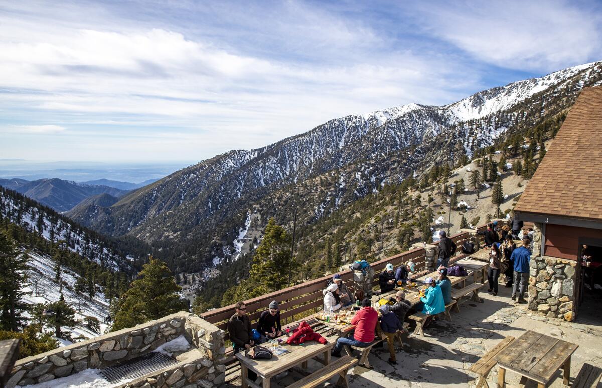 A Jan. 2020 photo shows people enjoying the view at The Notch at Mt. Baldy ski resort in Mt. Baldy.