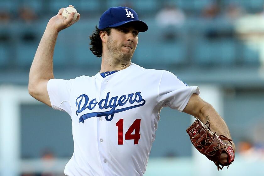 Dodgers starter Dan Haren delivers a pitch during Monday's game against the Cleveland Indians at Dodger Stadium.
