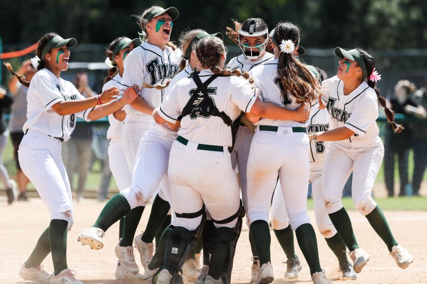 Poway, CA - June 03: Poway players celebrate beating Oaks Christian during the Division 1 Southern California regional title game at the school on Saturday, June 3, 2023 in Poway, CA. (Meg McLaughlin / The San Diego Union-Tribune)