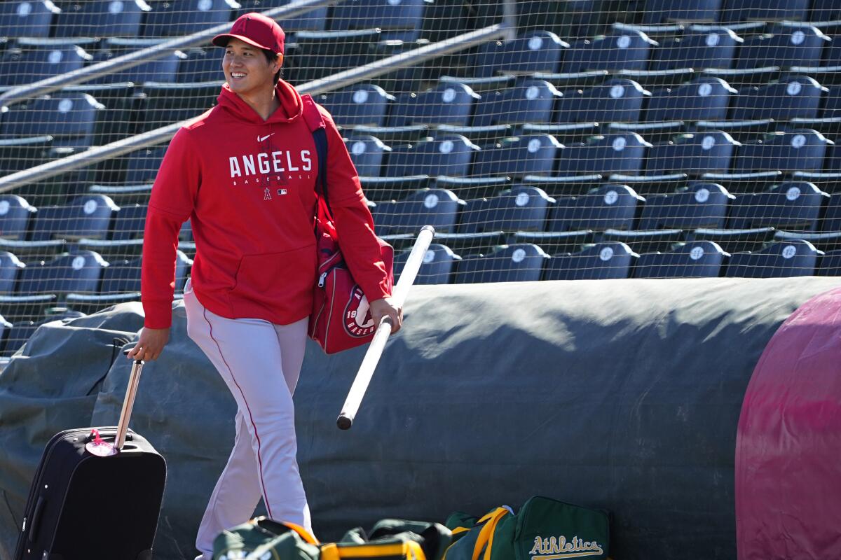 Angels starting pitcher Shohei Ohtani arrives prior to a spring training game against the Athletics.