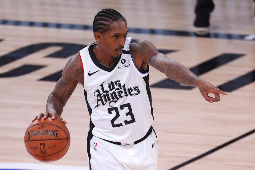 Clippers guard Lou Williams directs his teammates during Game 3 against the Dallas Mavericks.