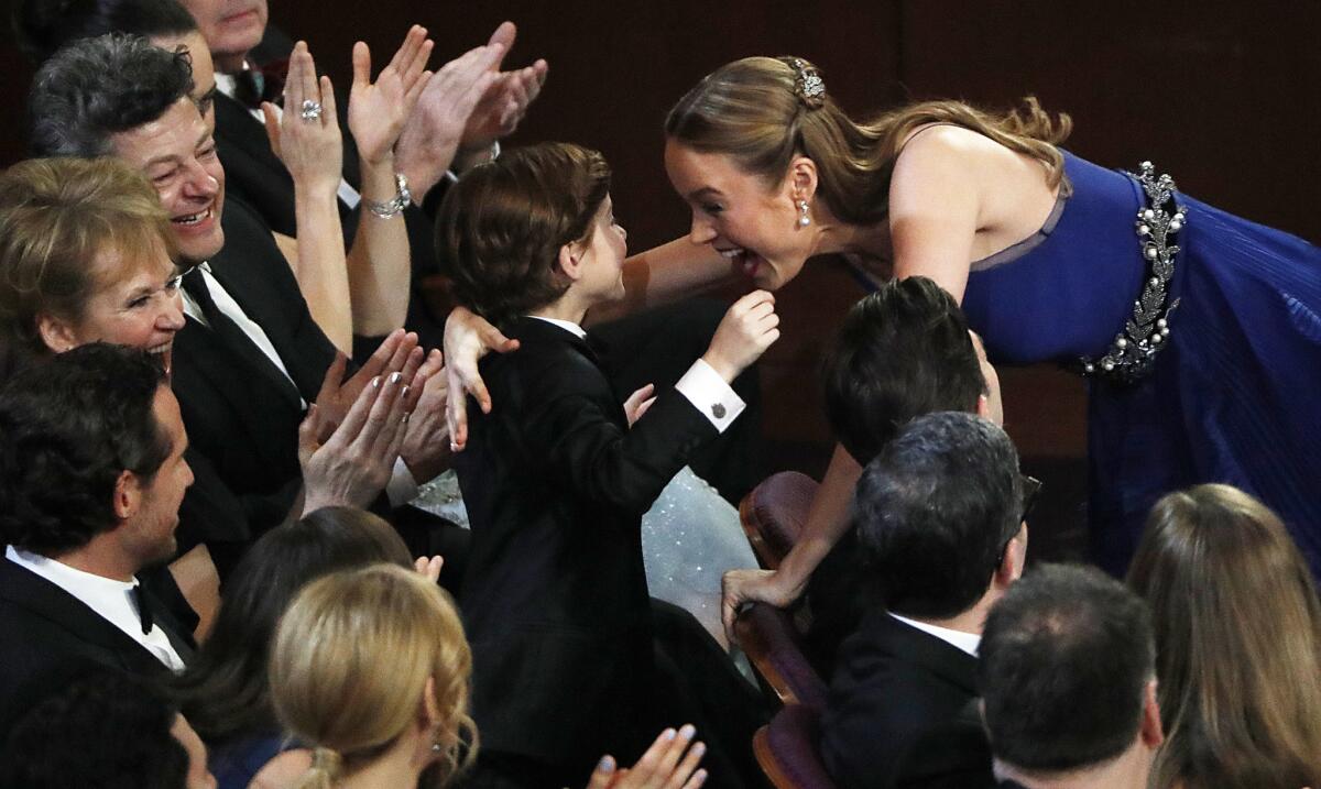 Brie Larson hugs her "Room" co-star Jacob Tremblay during the 88th Academy Awards.