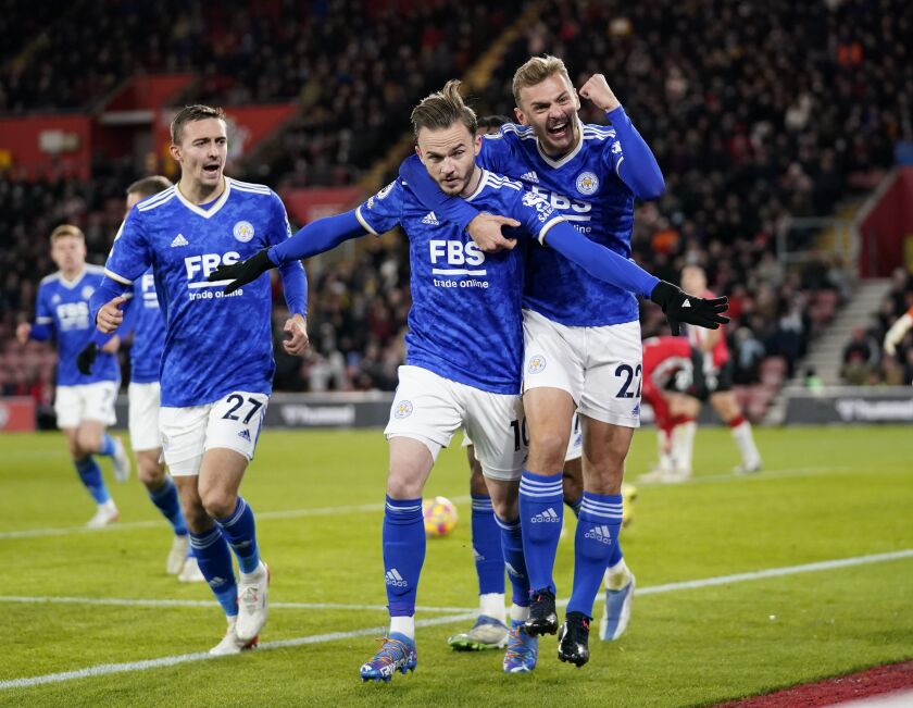 Leicester City's James Maddison, center left, celebrates with Kiernan Dewsbury-Hall after scoring during the English Premier League soccer match between Southampton and Leicester City at St Mary's Stadium, Southampton, England, Wednesday Dec. 1, 2021. (Andrew Matthews/PA via AP)