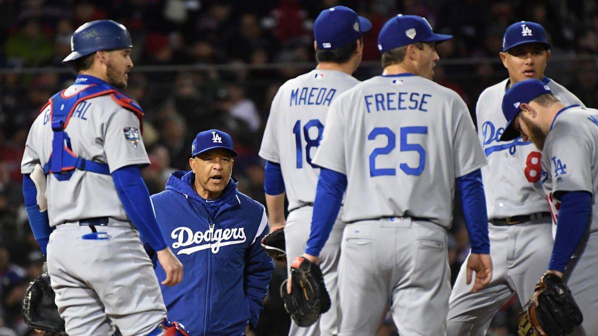 Dodgers manager Dave Roberts takes out relief pitcher Kenta Maeda in the seventh inning.