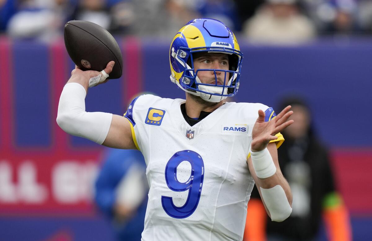 Rams quarterback Matthew Stafford throws during the first quarter against the New York Giants.