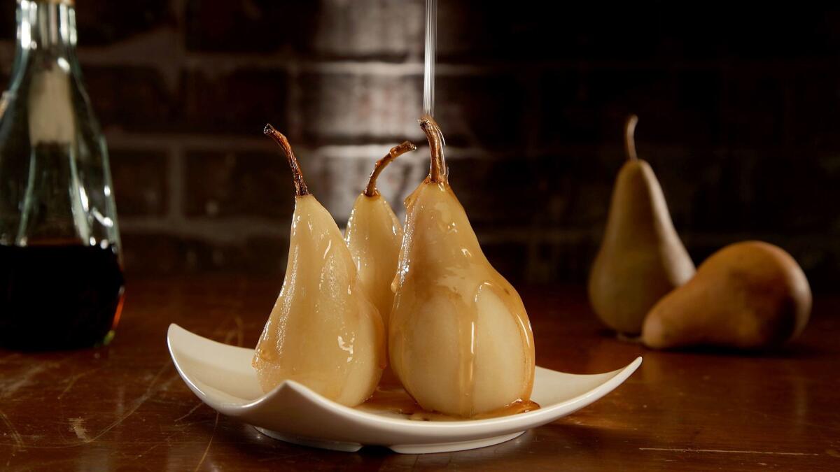 When poaching fruit, like these brandy-poached pears, it's a good idea to dilute the liquor with water to allow the flavors to come through.