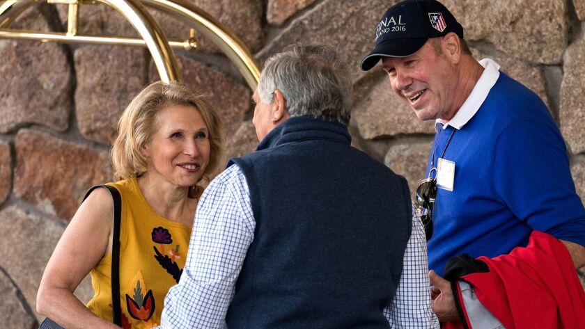 Shari Redstone, vice chairwoman of Viacom and CBS, speaks with CBS chief Leslie Moonves and former Disney chief Michael Eisner, right, in 2016.