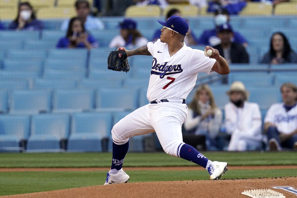 The Dodgers' Julio Urías delivers to the plate during the first inning April 10, 2021.